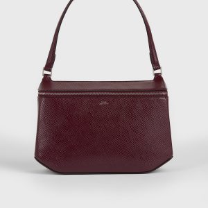 Toteme Studio Clip palmellato-patent shoulder cherry