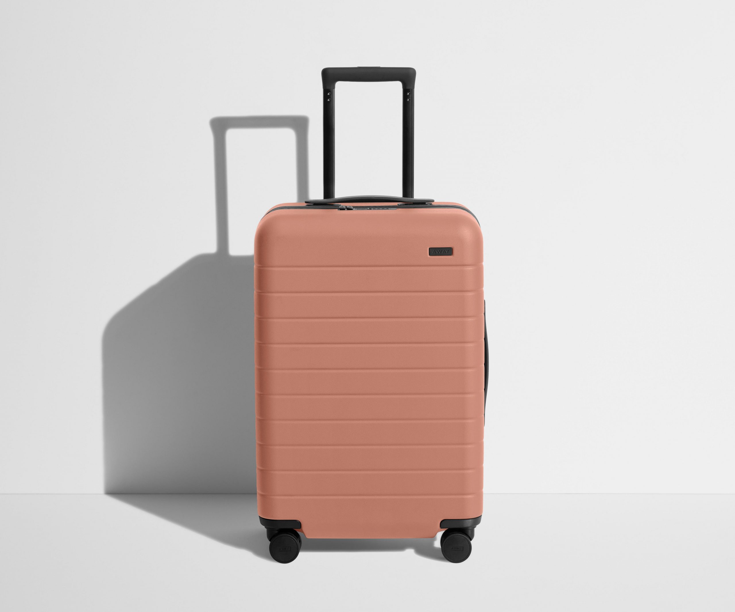 Away The Bigger Carry-On in Clay Pink