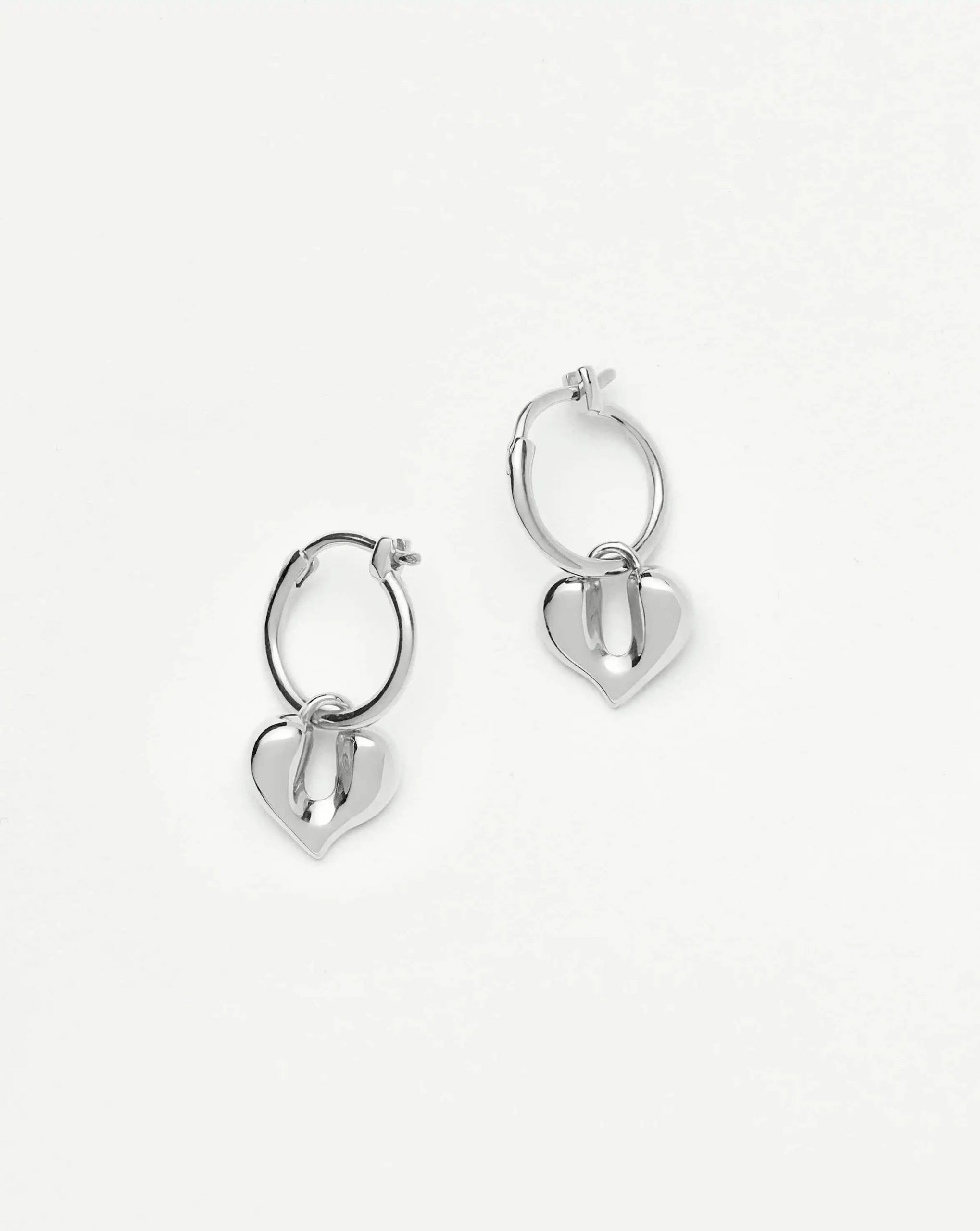 Missoma Molten Heart Charm Hoop Earrings | Silver Plated