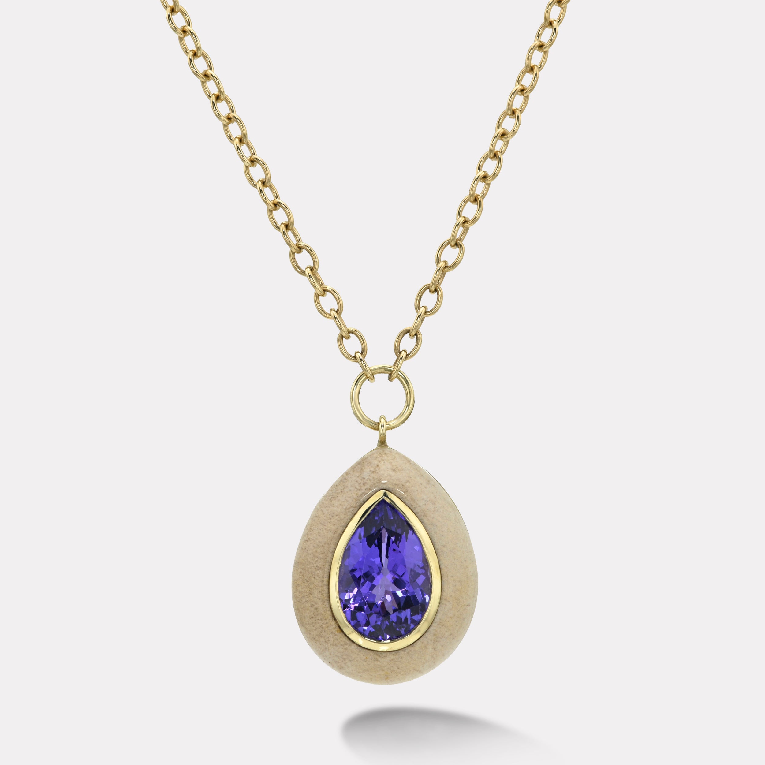 Retrouvai 8.46ct Pear Tanzanite in Petrified Wood Lollipop Pendant