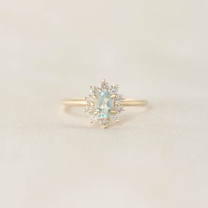 Linjer Sunburst Aquamarine Halo Ring - Evelina